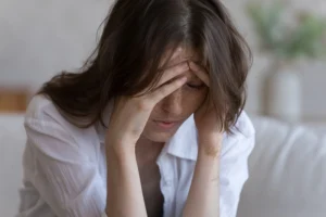 A woman struggles with hyperstimulation anxiety.