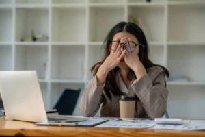 A woman struggles with a high-stress workplace.